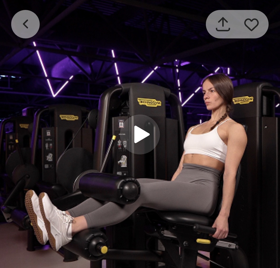 Сгибание голени сидя в блочном тренажере